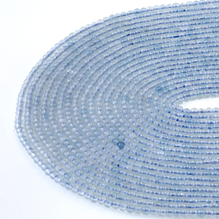 This is a Dakota Stones 3mm Aquamarine Gemstone strand with A grade round beads in 15-16 inch strand.