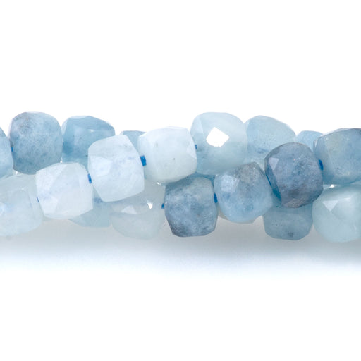 This is a Dakota Stones 4mm Aquamarine Banded Gemstone strand with faceted cube beads in 15-16 inch strand.