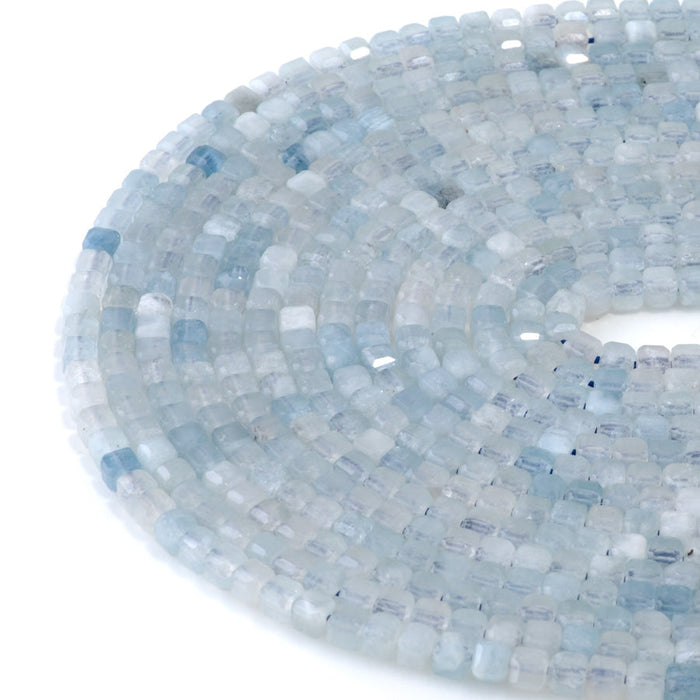 This is a Dakota Stones 4mm Aquamarine Gemstone strand with table-cut cube beads in 15-16 inch strand.