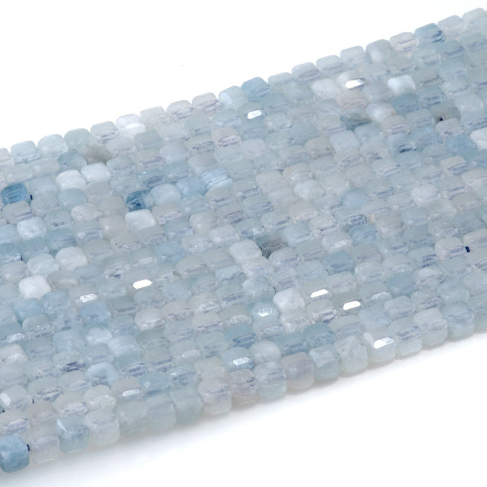 This is a Dakota Stones 4mm Aquamarine Gemstone strand with table-cut cube beads in 15-16 inch strand.