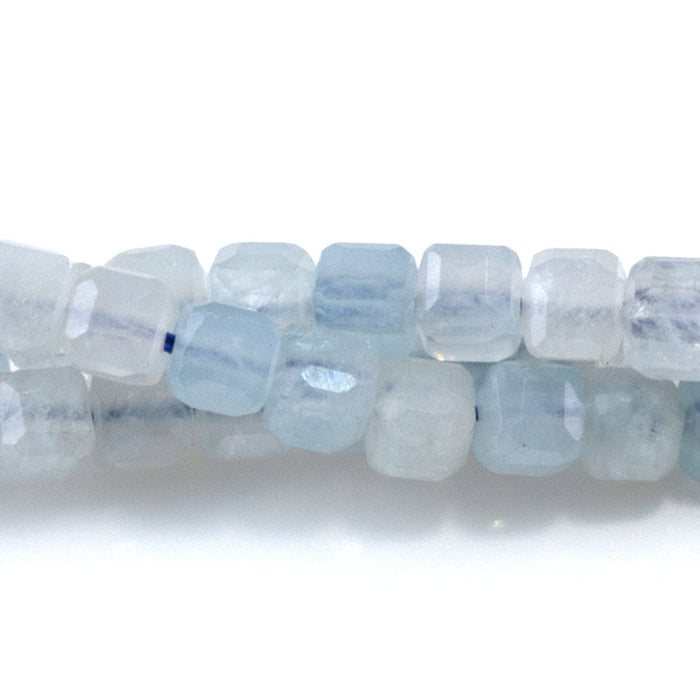This is a Dakota Stones 4mm Aquamarine Gemstone strand with table-cut cube beads in 15-16 inch strand.