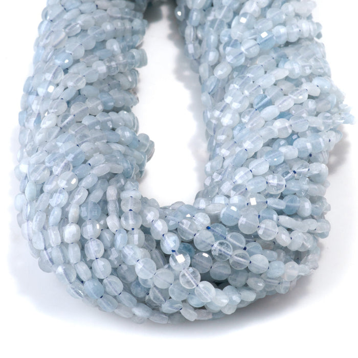 This is a Dakota Stones 4mm Aquamarine Gemstone strand with A grade faceted coin beads in 15-16 inch strand.