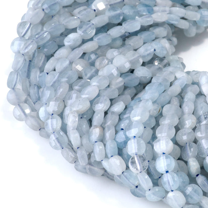 This is a Dakota Stones 4mm Aquamarine Gemstone strand with A grade faceted coin beads in 15-16 inch strand.