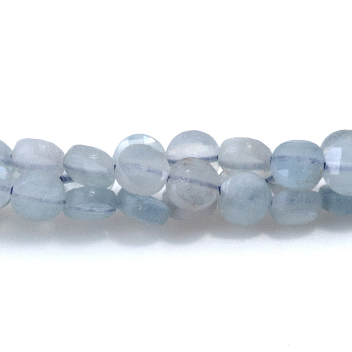This is a Dakota Stones 4mm Aquamarine Gemstone strand with A grade faceted coin beads in 15-16 inch strand.