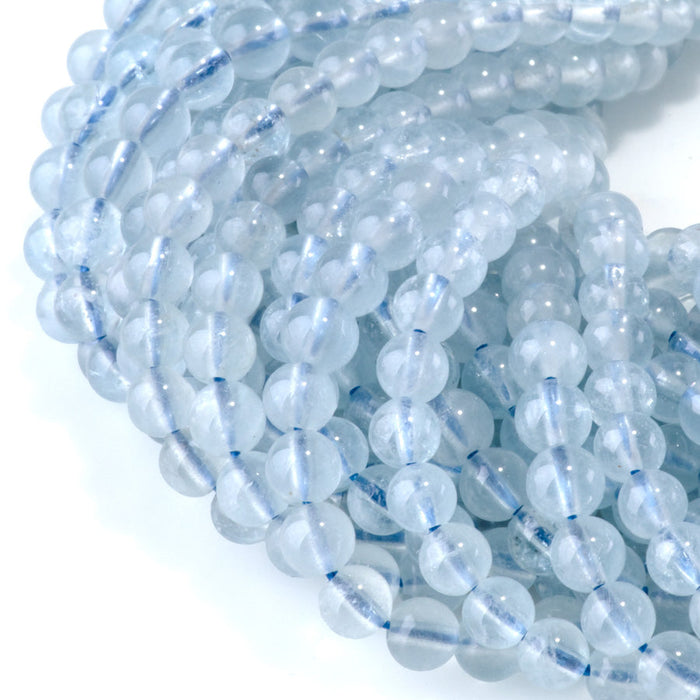 This is a Dakota Stones 4mm Aquamarine Gemstone strand with AAA grade round beads in 15-16 inch strand.
