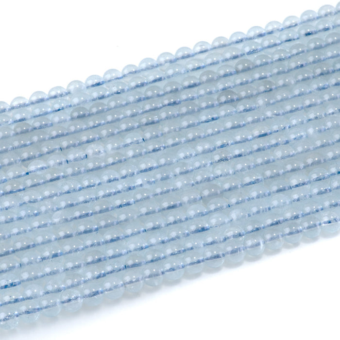 This is a Dakota Stones 4mm Aquamarine Gemstone strand with AAA grade round beads in 15-16 inch strand.