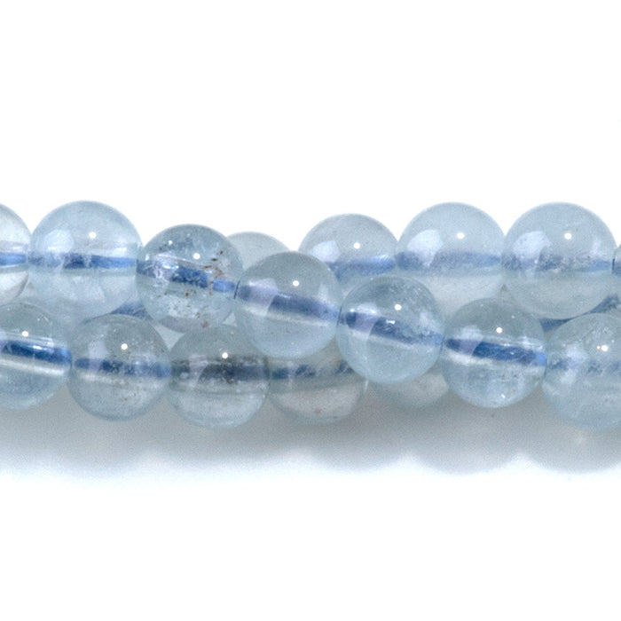 This is a Dakota Stones 4mm Aquamarine Gemstone strand with AAA grade round beads in 15-16 inch strand.