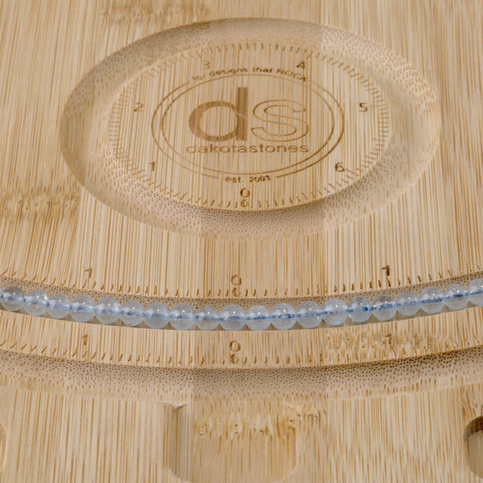 This is a Dakota Stones 4mm Aquamarine Gemstone strand with AAA grade round beads in 15-16 inch strand.