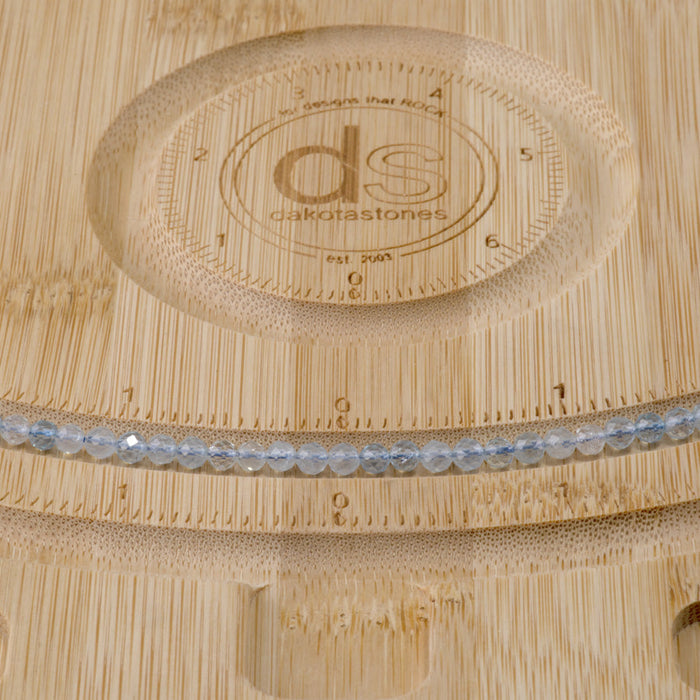 This is a Dakota Stones 4mm Aquamarine Gemstone strand with natural AAA grade faceted round beads in 15-16 inch strand.