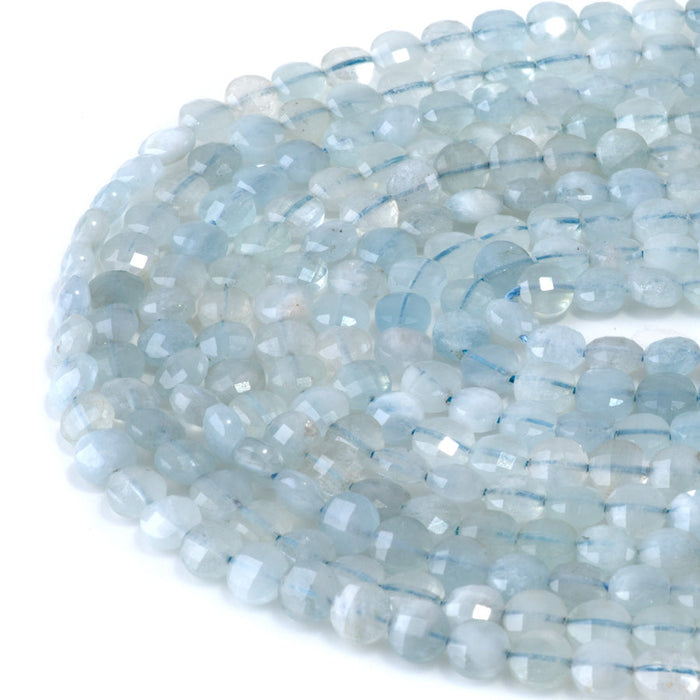 This is a Dakota Stones 6mm Aquamarine Gemstone strand with A grade faceted coin beads in 15-16 inch strand.