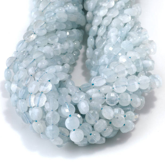 This is a Dakota Stones 6mm Aquamarine Gemstone strand with A grade faceted coin beads in 15-16 inch strand.