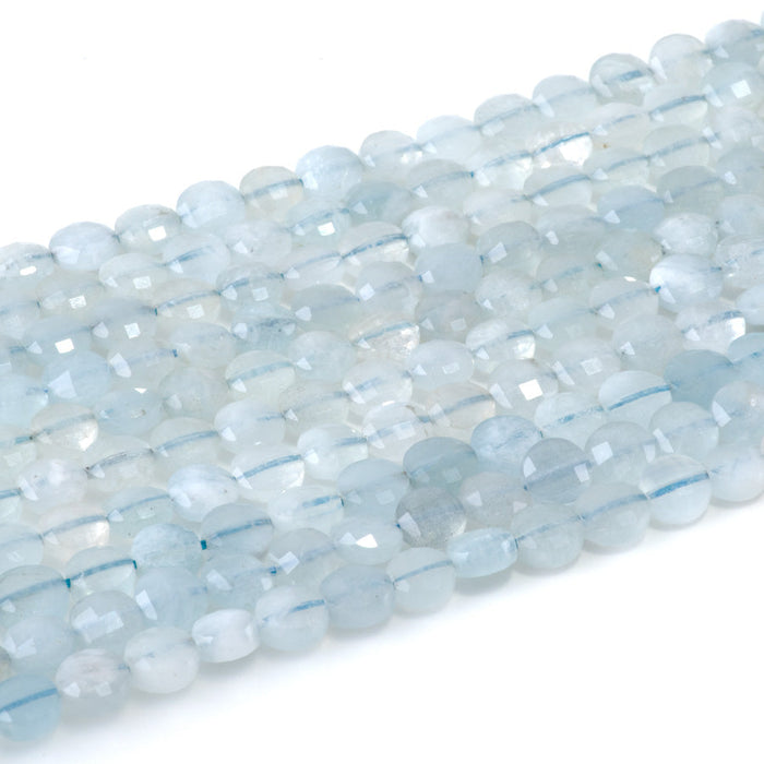 This is a Dakota Stones 6mm Aquamarine Gemstone strand with A grade faceted coin beads in 15-16 inch strand.