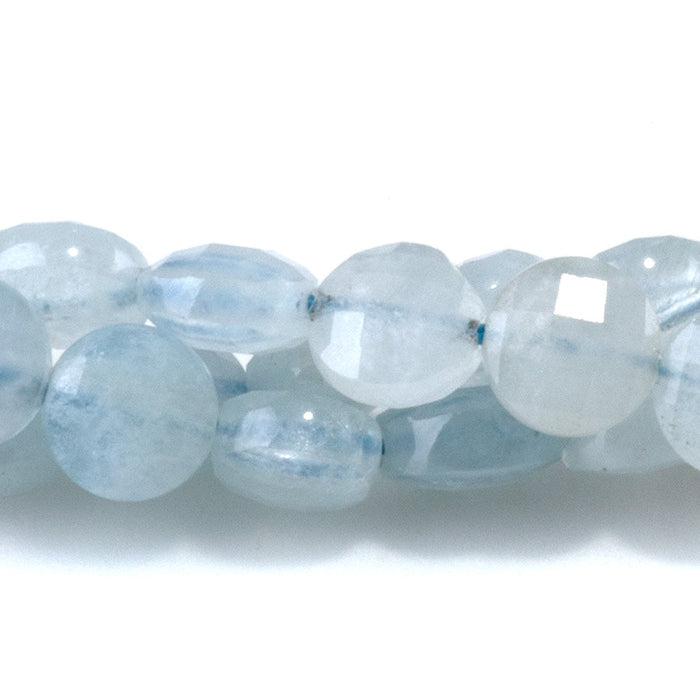This is a Dakota Stones 6mm Aquamarine Gemstone strand with A grade faceted coin beads in 15-16 inch strand.