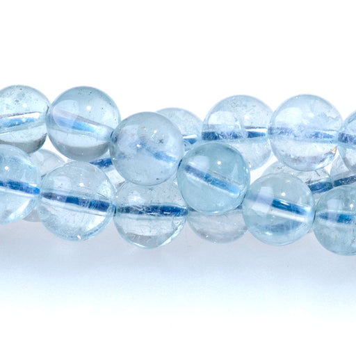 This is a Dakota Stones 6mm Aquamarine Gemstone strand with AAA grade round beads in 15-16 inch strand.