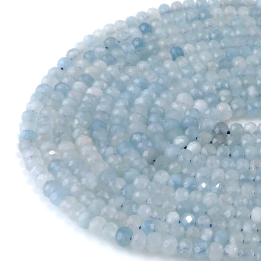This is a Dakota Stones 4x6mm Aquamarine Gemstone strand with faceted rondelle beads in 15-16 inch strand.