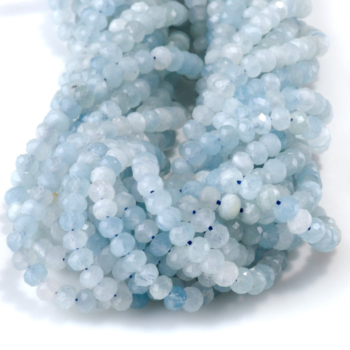 This is a Dakota Stones 4x6mm Aquamarine Gemstone strand with faceted rondelle beads in 15-16 inch strand.
