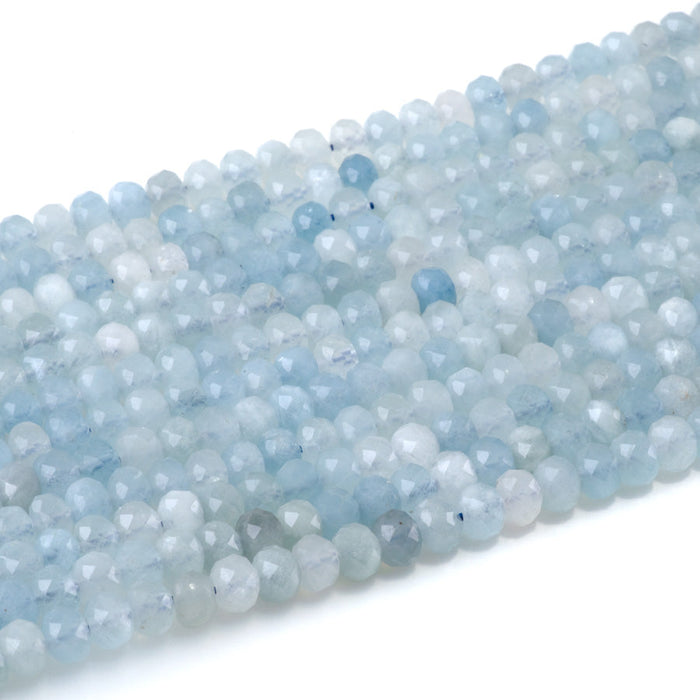 This is a Dakota Stones 4x6mm Aquamarine Gemstone strand with faceted rondelle beads in 15-16 inch strand.