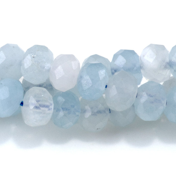 This is a Dakota Stones 4x6mm Aquamarine Gemstone strand with faceted rondelle beads in 15-16 inch strand.