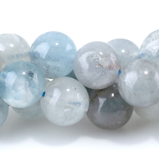 This is a Dakota Stones 8mm Devil Aquamarine Gemstone strand with round beads in 15-16 inch strand.