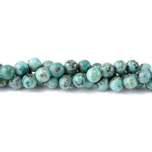 This is a Dakota Stones 10mm African Turquoise Gemstone strand with AAA grade round beads in 15-16 inch strand.