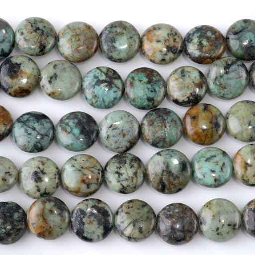 This is a Dakota Stones 12mm African Turquoise Gemstone strand with coin beads in 8 inch strand.