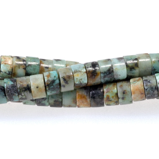 This is a Dakota Stones 2x4mm African Turquoise Gemstone strand with heishi beads in 15-16 inch strand.