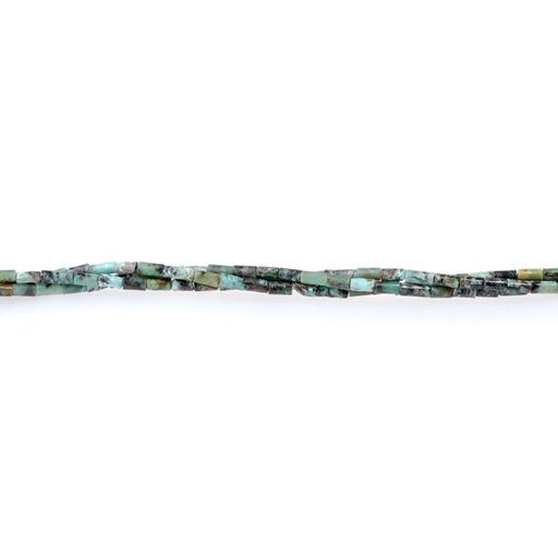 This is a Dakota Stones 2x4mm African Turquoise Tube Gemstone strand of round beads in 15-16 inch strand.