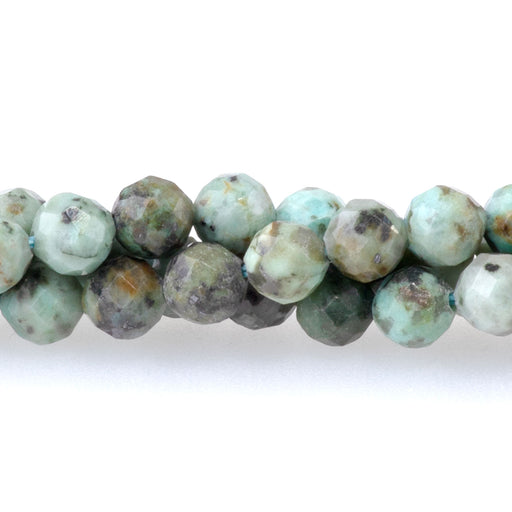 This is a Dakota Stones 4mm African Turquoise Microfaceted Gemstone strand with round beads in 15-16 inch strand.