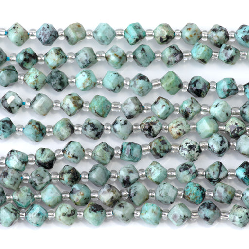 This is a Dakota Stones 4x6mm African Turquoise Corner Gemstone strand with table-cut cube beads in 15-16 inch strand.