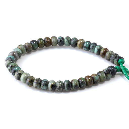 This is a Dakota Stones 5x8mm African Turquoise Large Hole Gemstone strand with rondelle beads in 8 inch strand.