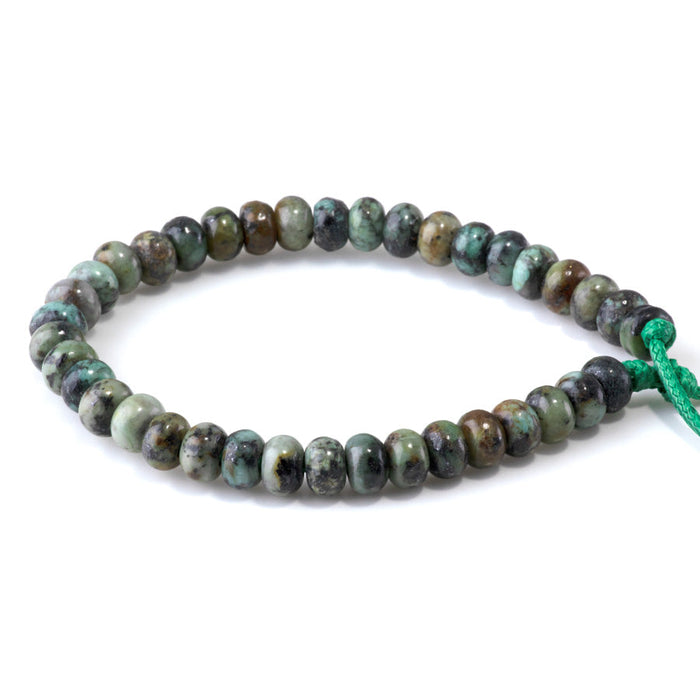 This is a Dakota Stones 5x8mm African Turquoise Large Hole Gemstone strand with rondelle beads in 8 inch strand.