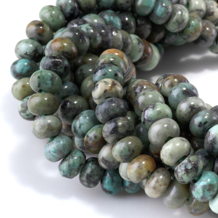 This is a Dakota Stones 5x8mm African Turquoise Large Hole Gemstone strand with rondelle beads in 8 inch strand.