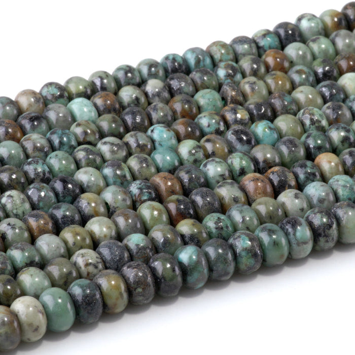 This is a Dakota Stones 5x8mm African Turquoise Large Hole Gemstone strand with rondelle beads in 8 inch strand.