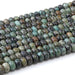 This is a Dakota Stones 5x8mm African Turquoise Large Hole Gemstone strand with rondelle beads in 8 inch strand.