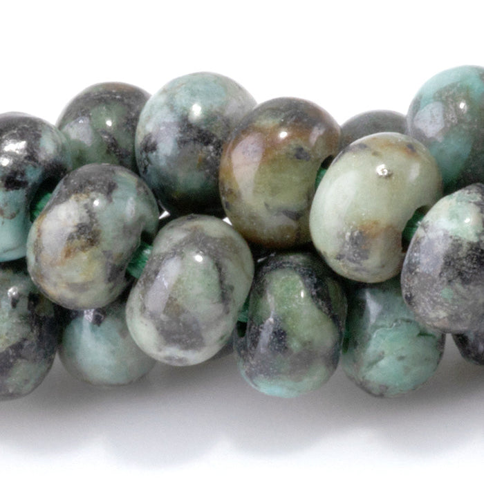 This is a Dakota Stones 5x8mm African Turquoise Large Hole Gemstone strand with rondelle beads in 8 inch strand.