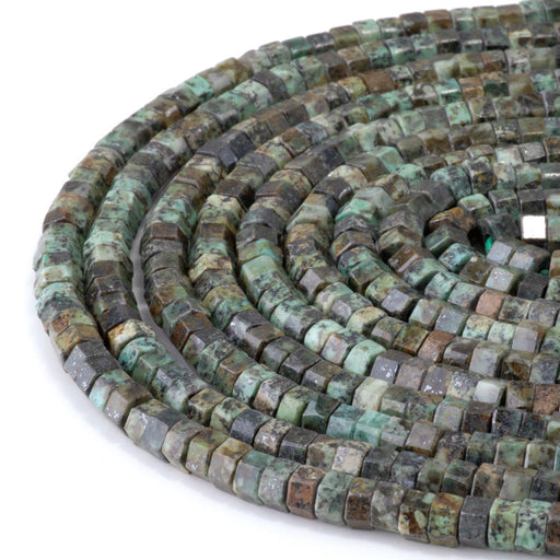 This is a Dakota Stones 6mm African Turquoise Large Hole Gemstone strand with faceted hexagon beads in 8 inch strand.