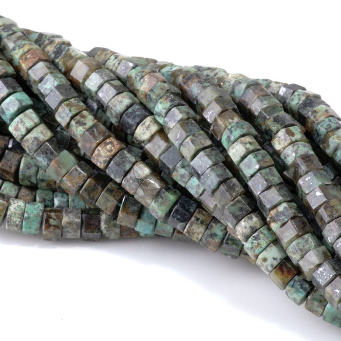 This is a Dakota Stones 6mm African Turquoise Large Hole Gemstone strand with faceted hexagon beads in 8 inch strand.