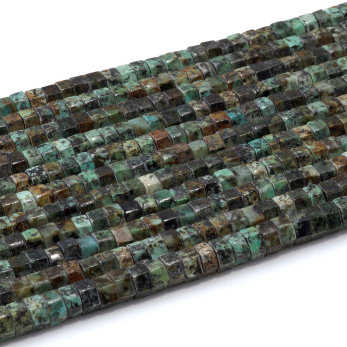 This is a Dakota Stones 6mm African Turquoise Large Hole Gemstone strand with faceted hexagon beads in 8 inch strand.