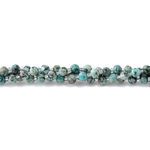 This is a Dakota Stones 6mm African Turquoise Lantern Gemstone strand with A grade faceted beads in 15-16 inch strand.