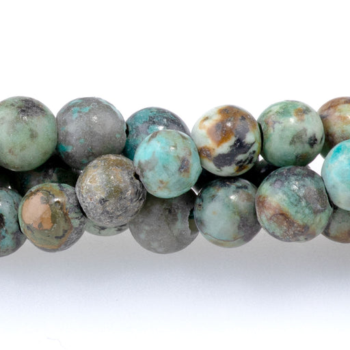 This is a Dakota Stones 6mm African Turquoise Large Hole Gemstone strand with matte round beads.