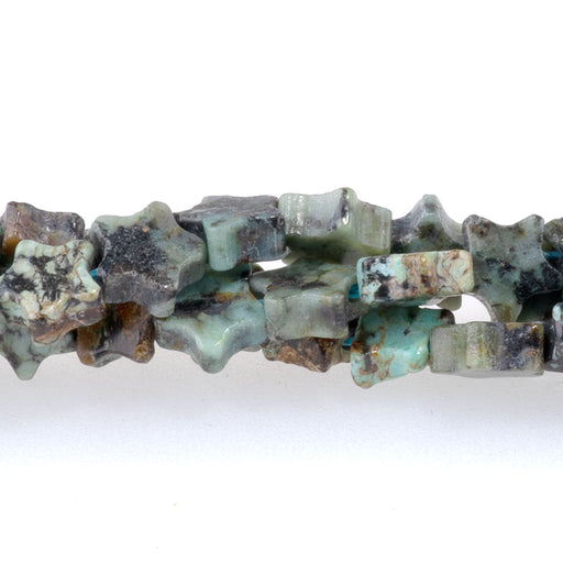 This is a Dakota Stones 6mm African Turquoise Gemstone strand with star beads in 15-16 inch strand.