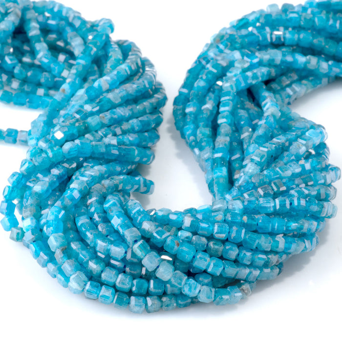 This is a Dakota Stones 3mm Blue Apatite Gemstone strand with A grade table-cut cube beads in 15-16 inch strand.