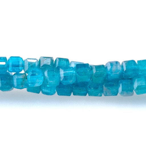 This is a Dakota Stones 3mm Blue Apatite Gemstone strand with A grade table-cut cube beads in 15-16 inch strand.