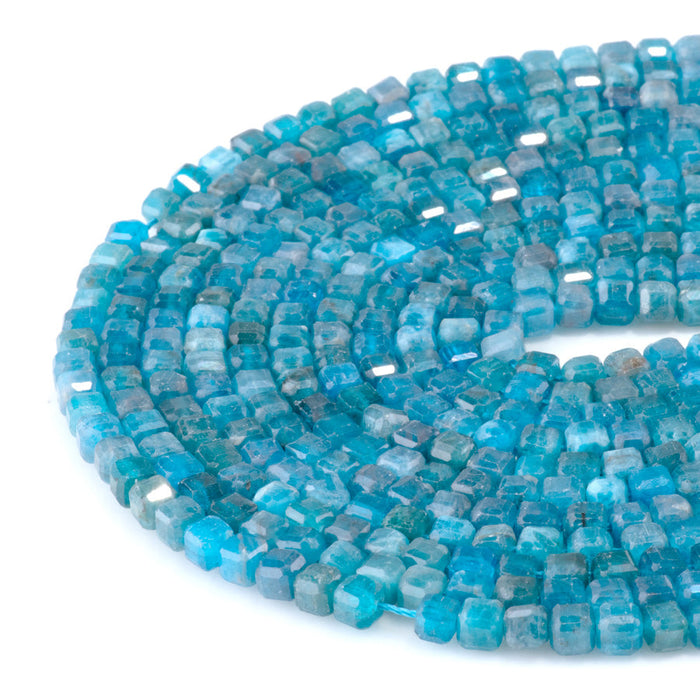 This is a Dakota Stones 4mm Blue Apatite Gemstone strand with table-cut cube beads in 15-16 inch strand.