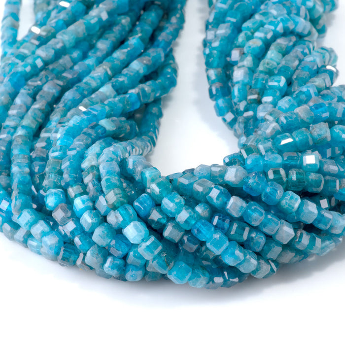 This is a Dakota Stones 4mm Blue Apatite Gemstone strand with table-cut cube beads in 15-16 inch strand.
