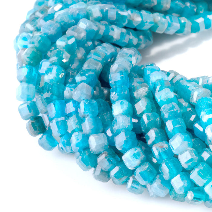 This is a Dakota Stones 4mm Blue Apatite Gemstone strand with table-cut cube beads in 15-16 inch strand.