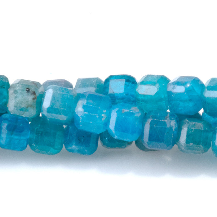 This is a Dakota Stones 4mm Blue Apatite Gemstone strand with table-cut cube beads in 15-16 inch strand.