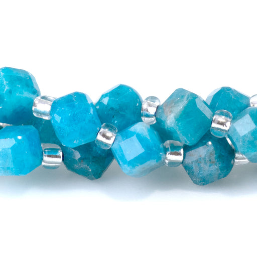 This is a Dakota Stones 4x6mm Blue Apatite Corner Gemstone strand with table-cut cube beads in 15-16 inch strand.
