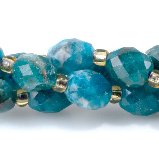 This is a Dakota Stones 7x8mm Blue Apatite Rice Gemstone strand with faceted beads in 15-16 inch strand.