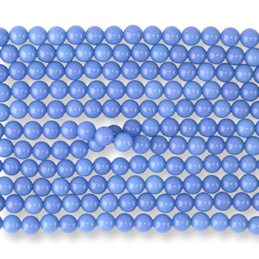 This is a Dakota Stones 8mm Blue Aragonite Gemstone strand with round beads in 15-16 inch strand.